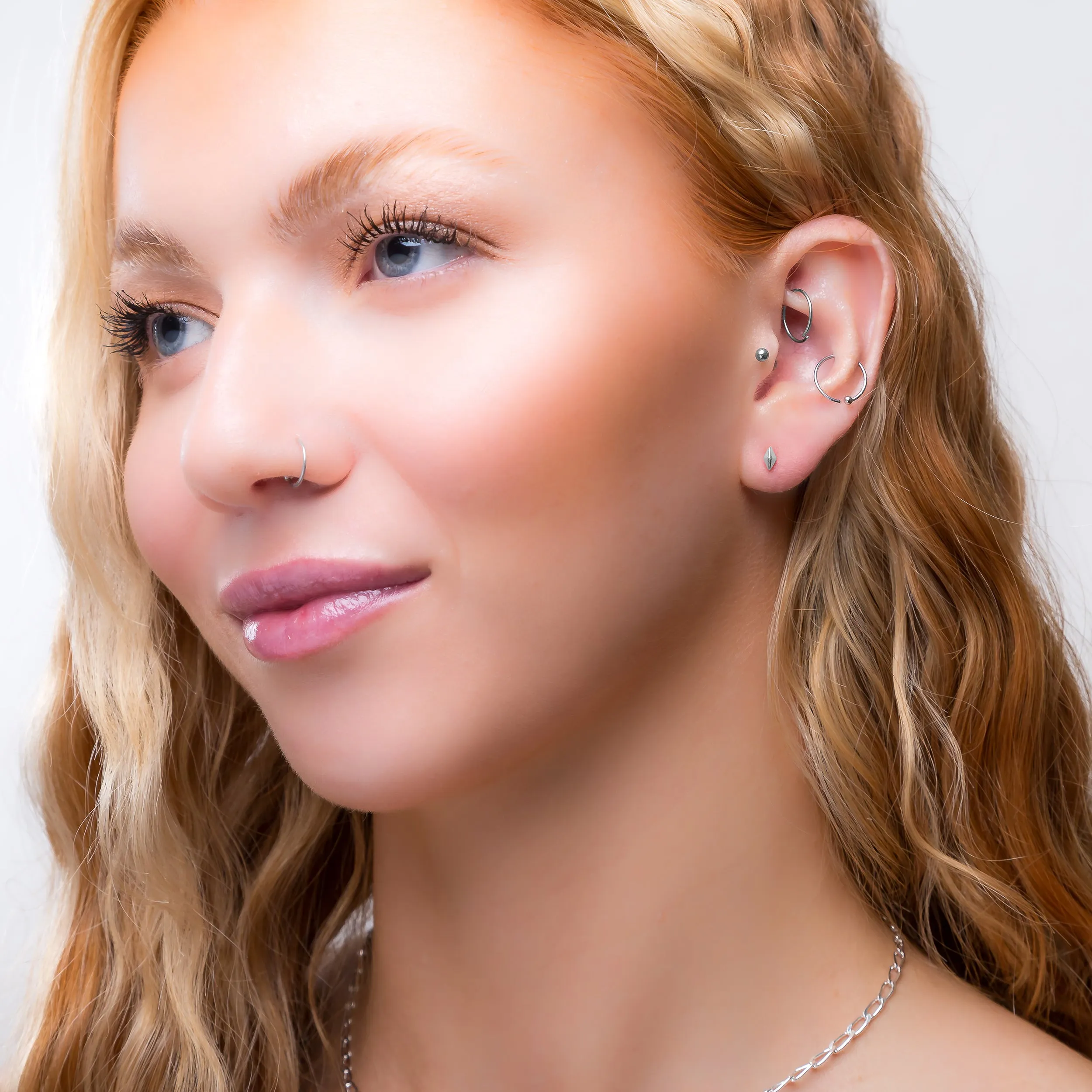 Tiny Rhombus Stud Earrings in Silver sold by Henryka product image thumbnail 3