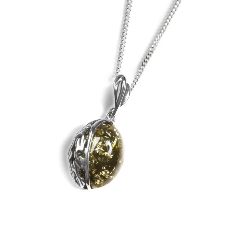 Green Amber Oval Necklace in Silver sold by Henryka