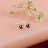 Minimal Small Round Stud Earrings in Silver and Black Pearl sold by Henryka