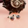 Minimal Small Round Stud Earrings in Silver and Black Pearl sold by Henryka