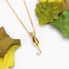 Miniature Cat Necklace in Silver with 24ct Gold sold by Henryka