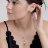 Miniature Hamsa Hand Necklace in Silver and Turquoise sold by Henryka