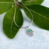 Miniature Hamsa Hand Necklace in Silver and Turquoise sold by Henryka