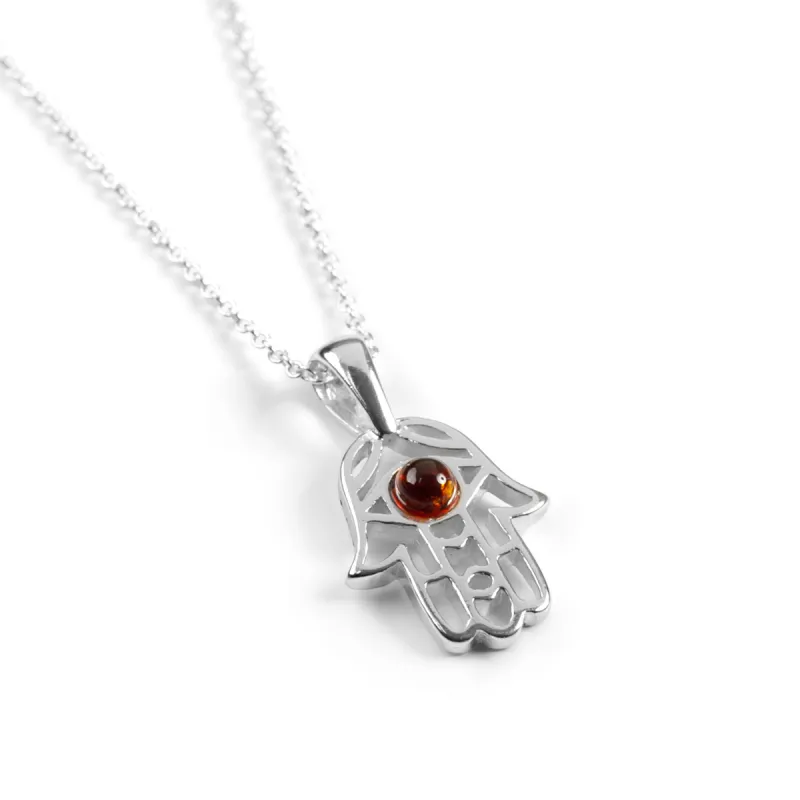 Miniature Hamsa Hand Necklace in Silver and Amber sold by Henryka