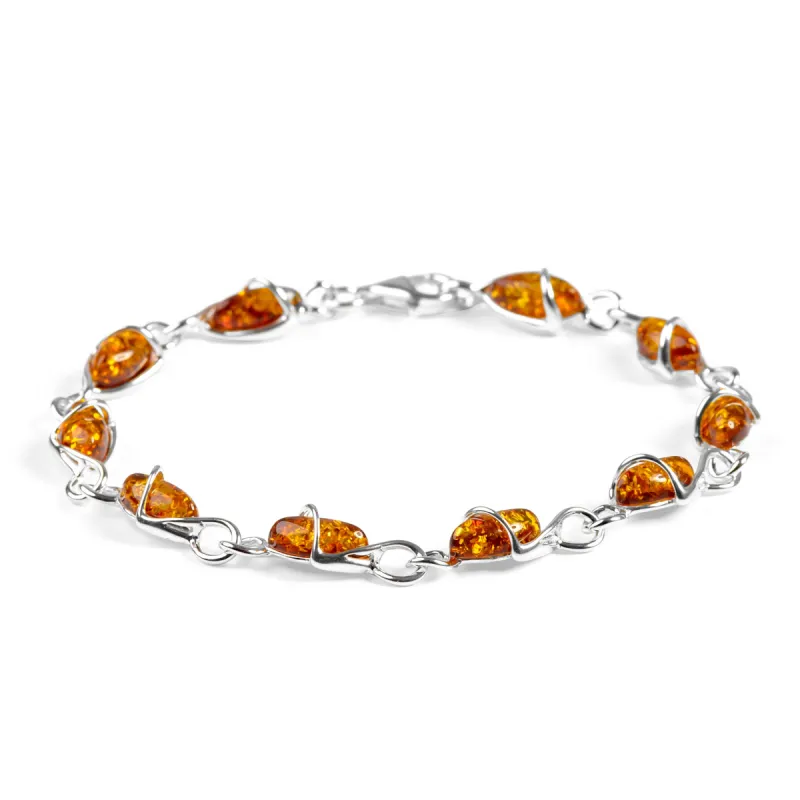 Elegant Twist Bracelet in Silver and Amber sold by Henryka