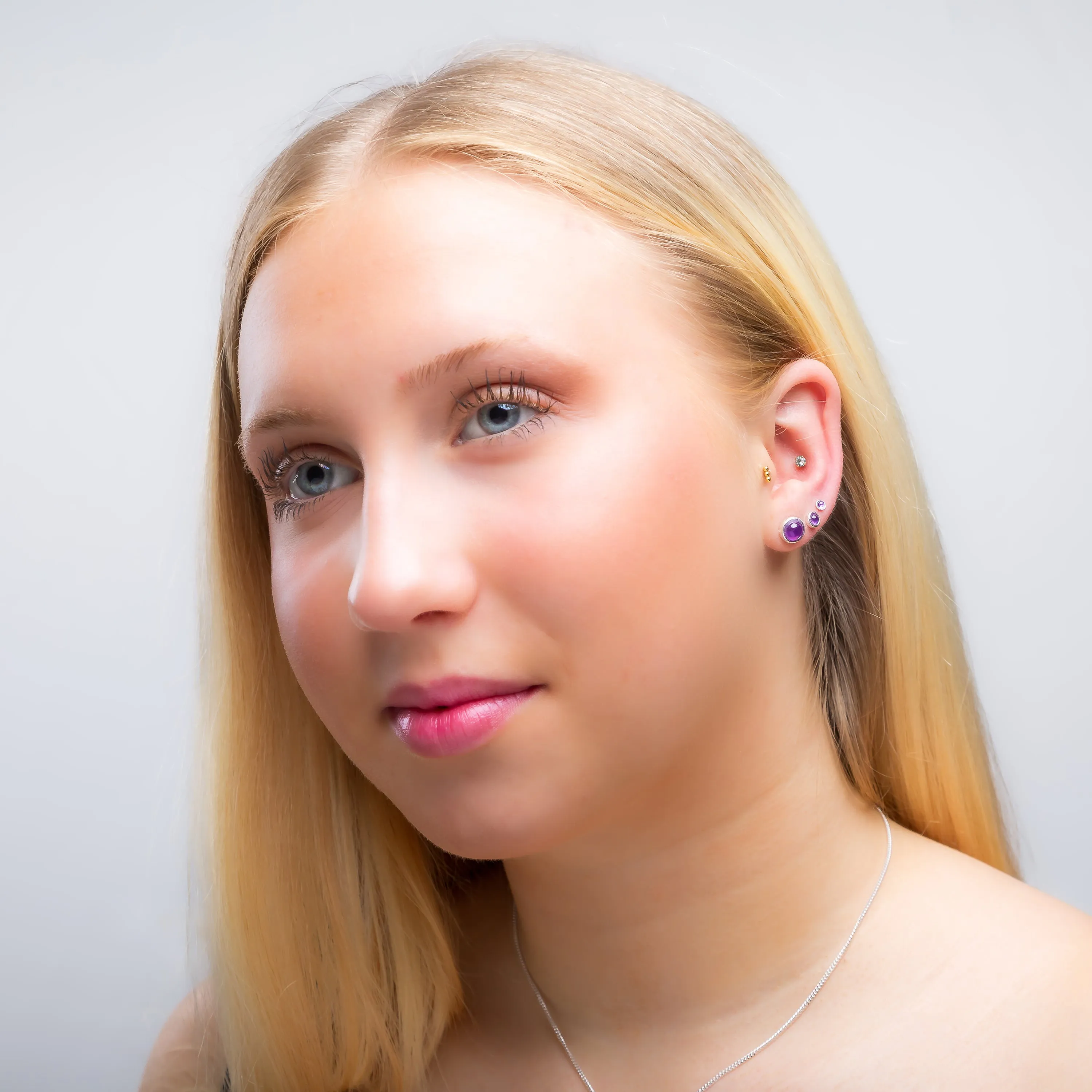 Teeny Tiny Round Stud Earrings in Silver and Amethyst sold by Henryka product image thumbnail 4