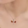 Dragonfly Necklace in Silver and Cognac Amber sold by Henryka