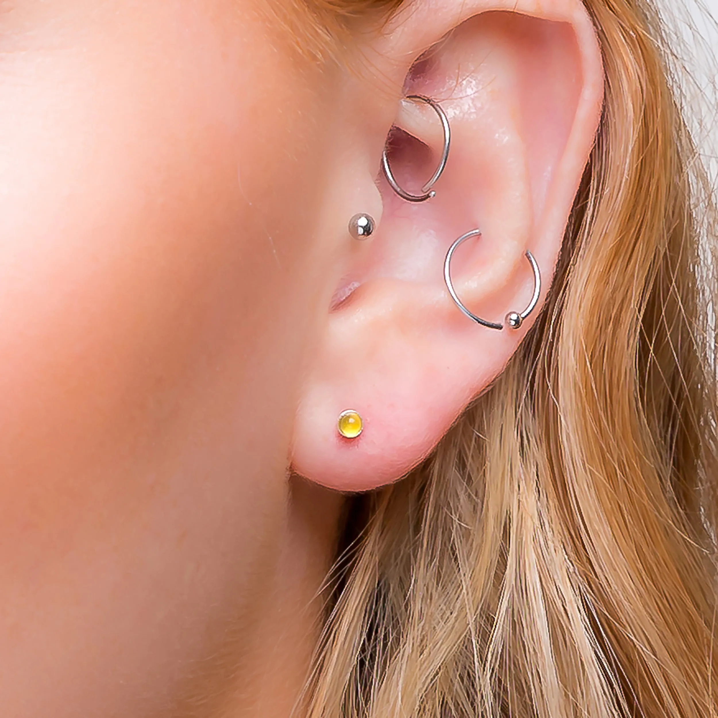 Teeny Tiny Round Stud Earrings in Silver and Yellow Chalcedony sold by Henryka product image thumbnail 2