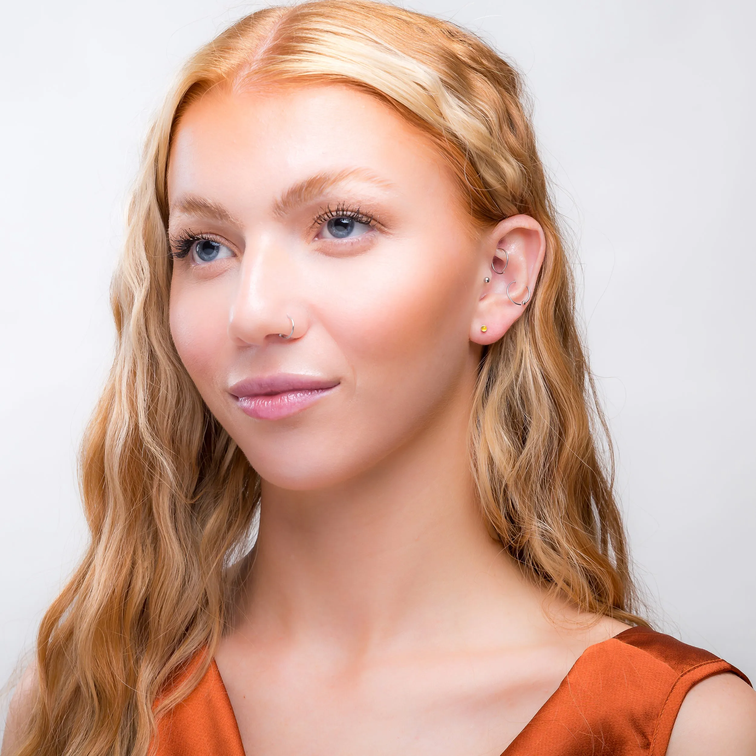 Teeny Tiny Round Stud Earrings in Silver and Yellow Chalcedony sold by Henryka product image thumbnail 4