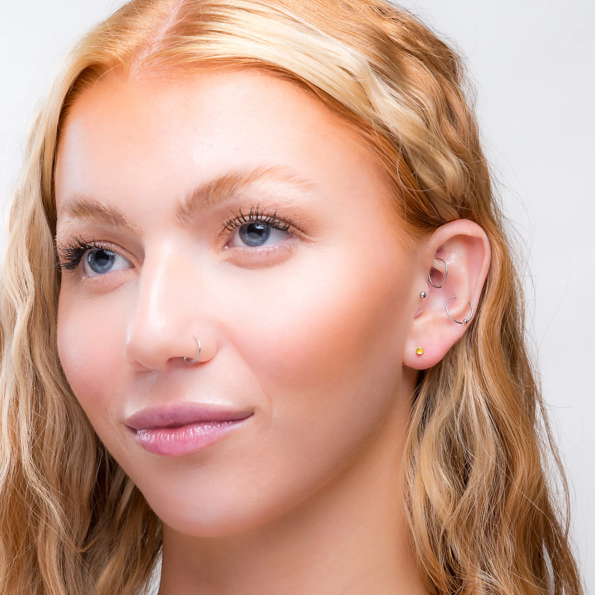 Teeny Tiny Round Stud Earrings in Silver and Yellow Chalcedony sold by Henryka product image thumbnail 3