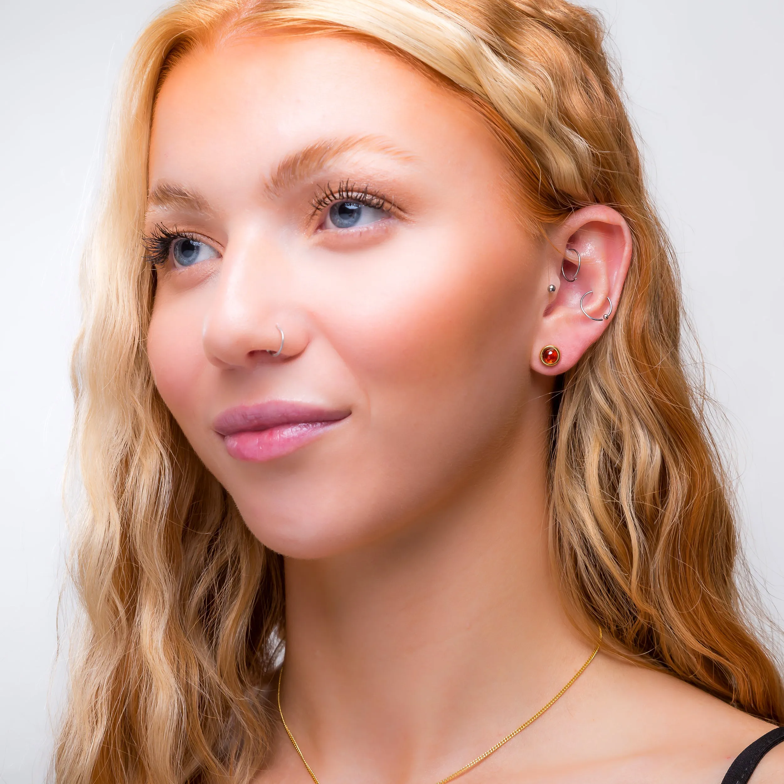 Small Round Stud Earrings in Silver with 24ct Gold & Cognac Amber sold by Henryka product image thumbnail 3