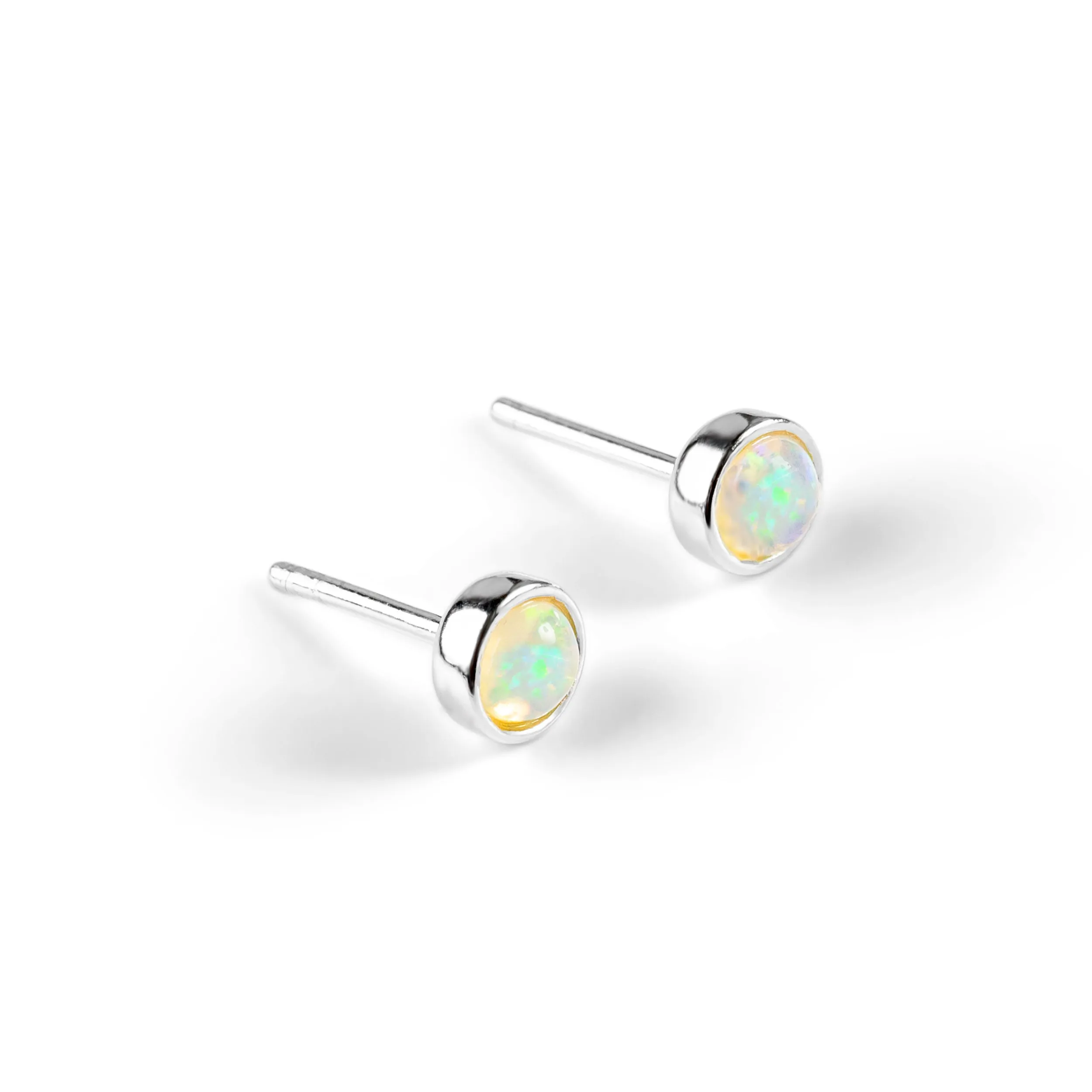 Minimalist Circle Stud Earrings in Silver and Ethiopian Opal sold by Henryka