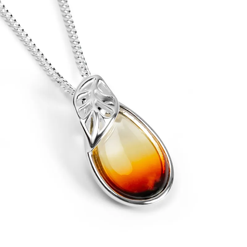Sunset Teardrop with Leaf Necklace in Silver and Amber sold by Henryka