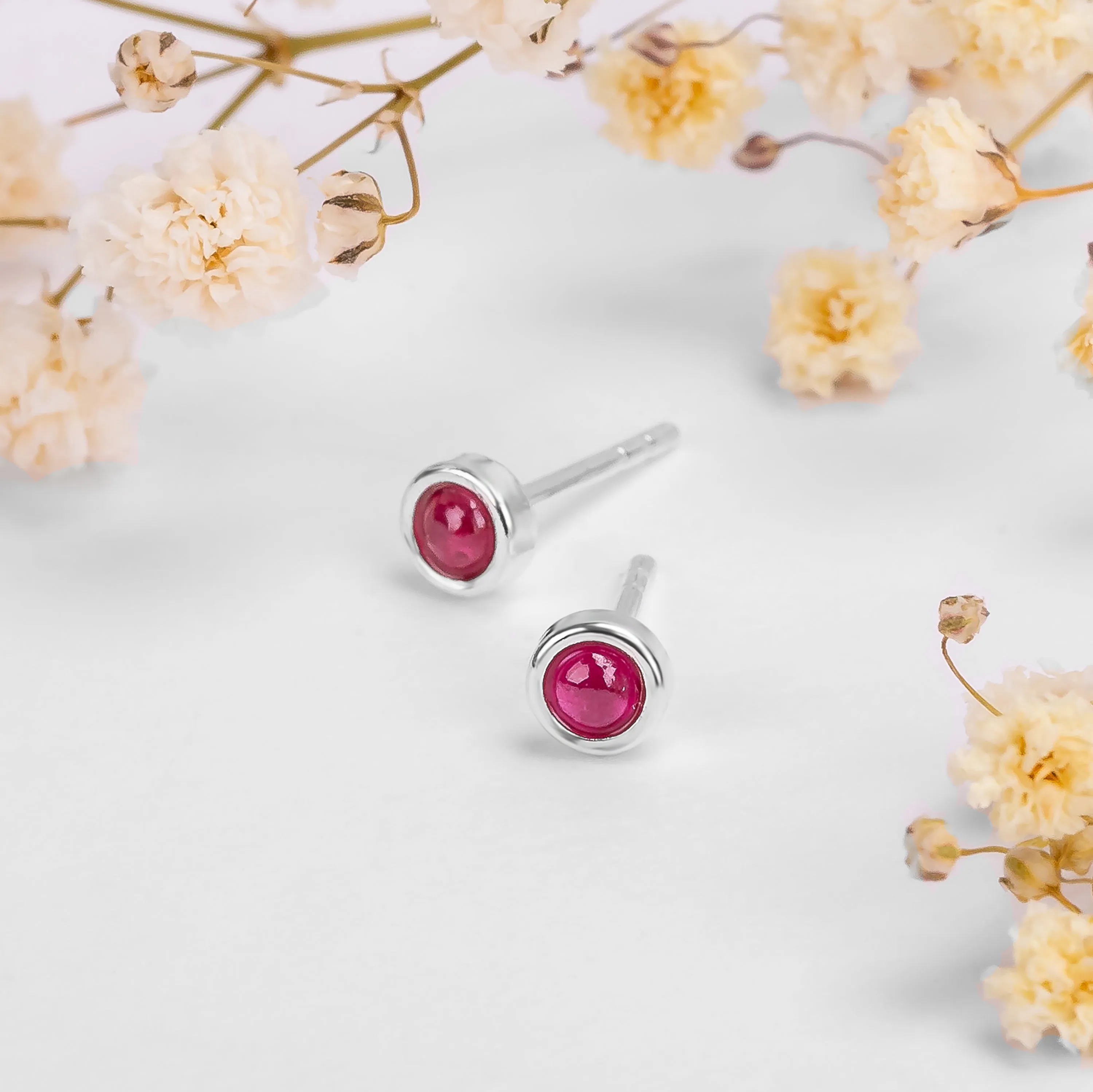 Minimalist Circle Stud Earrings in Silver and Ruby sold by Henryka product image thumbnail 2