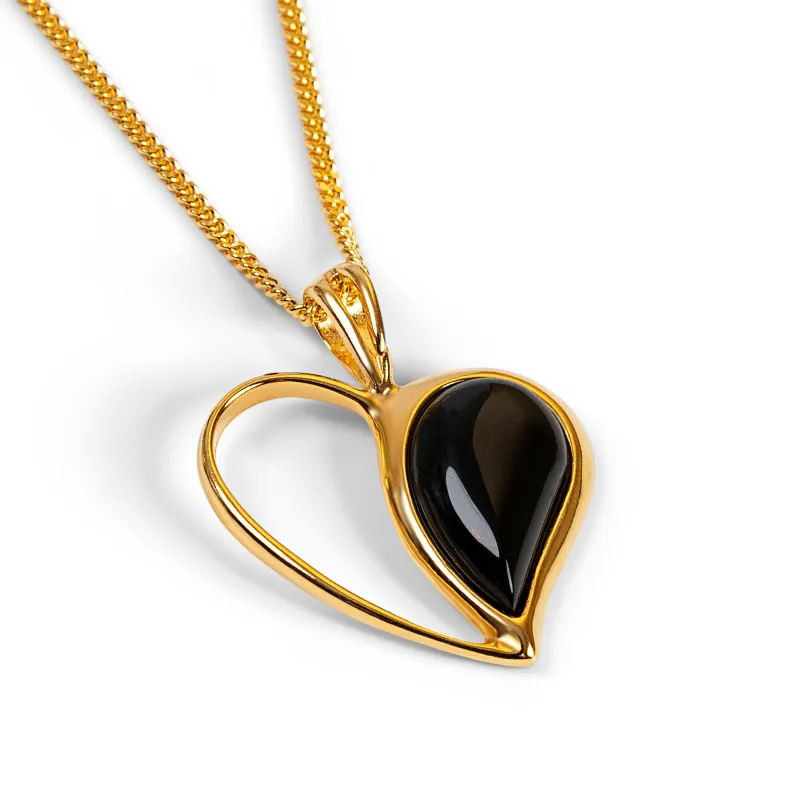 Heart Necklace in Silver with 24ct Gold and Black Onyx sold by Henryka
