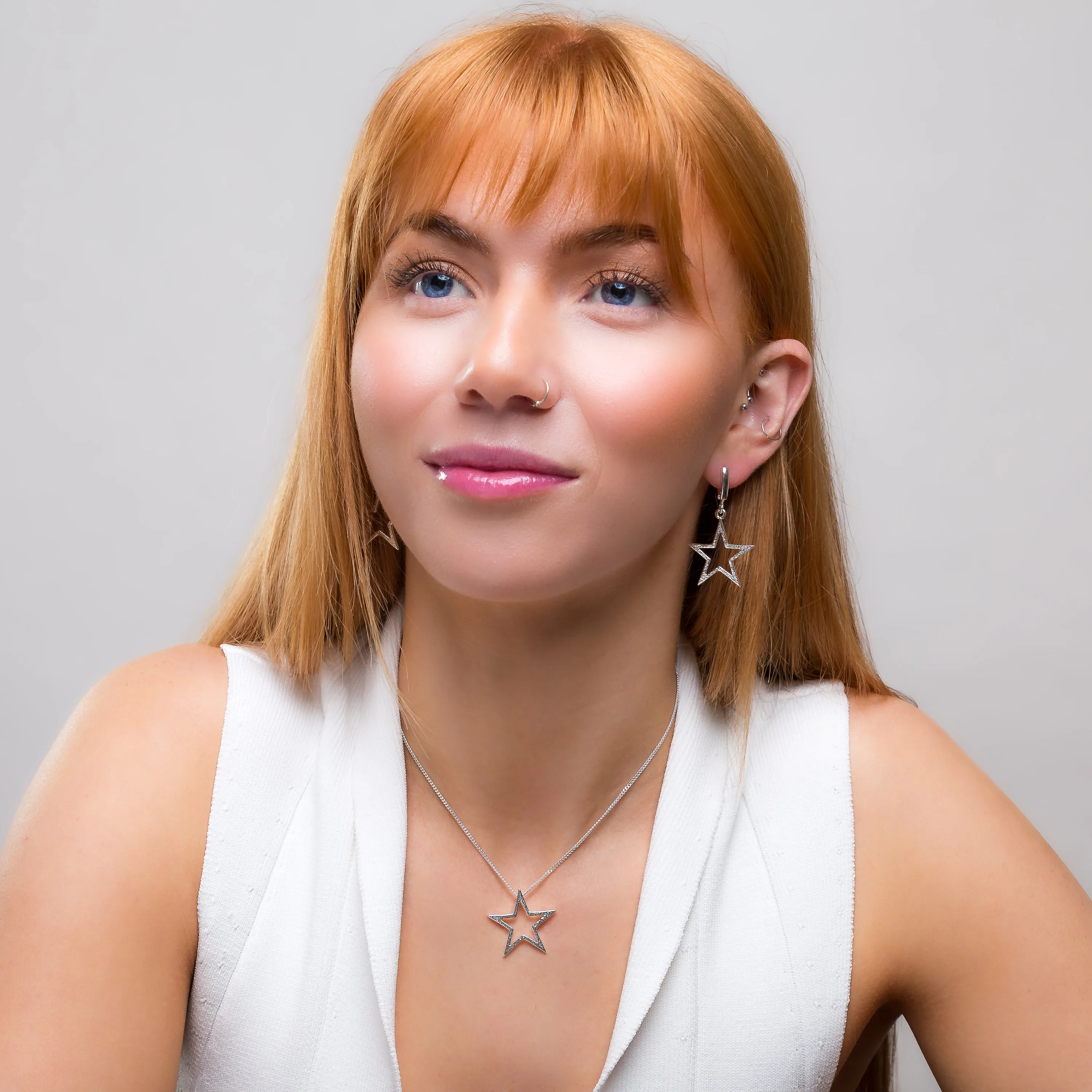 Textured Sparkling Star Drop Earrings in Silver sold by Henryka product image thumbnail 5