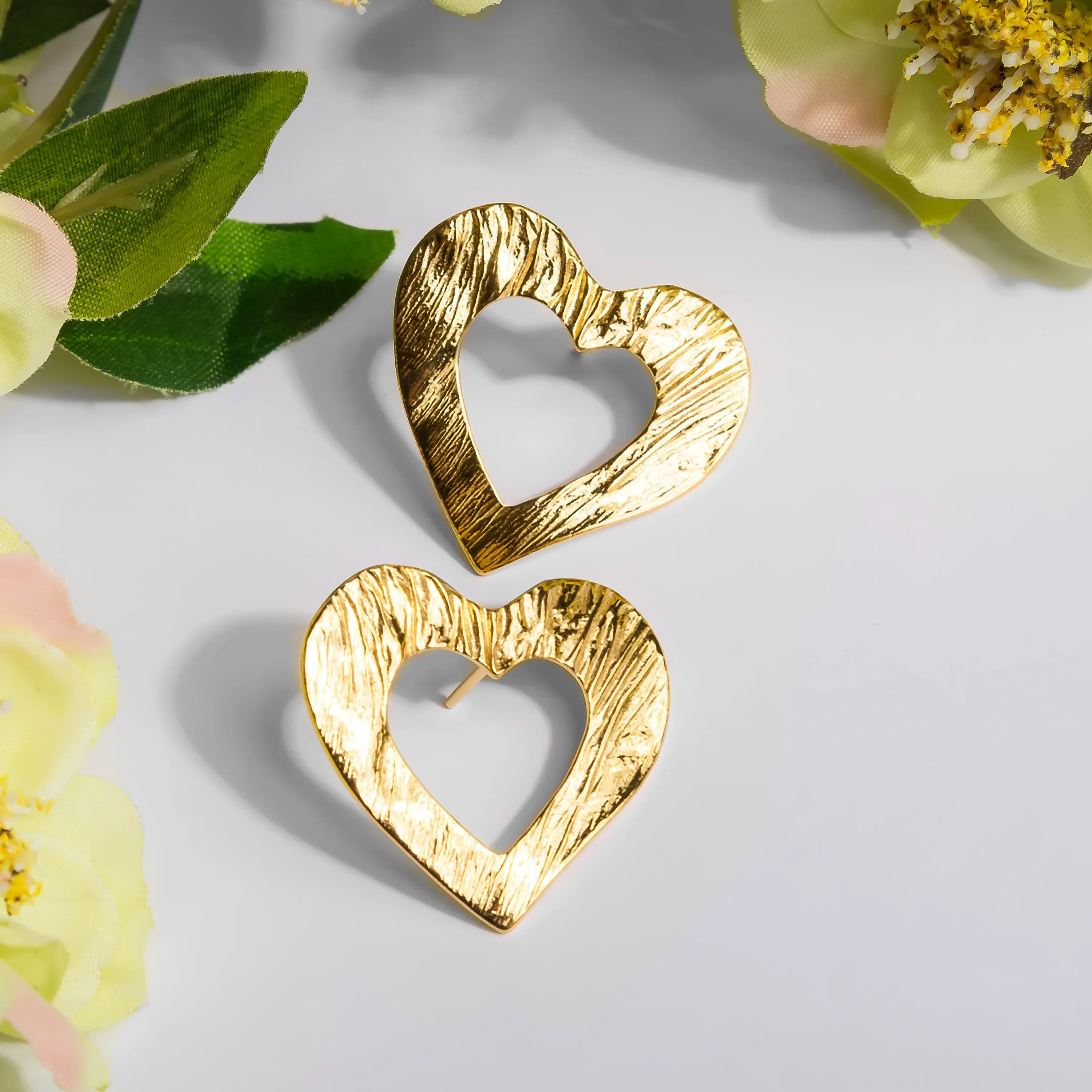Statement Textured Open Heart Stud Earrings in Silver with 24ct Gold sold by Henryka product image thumbnail 4