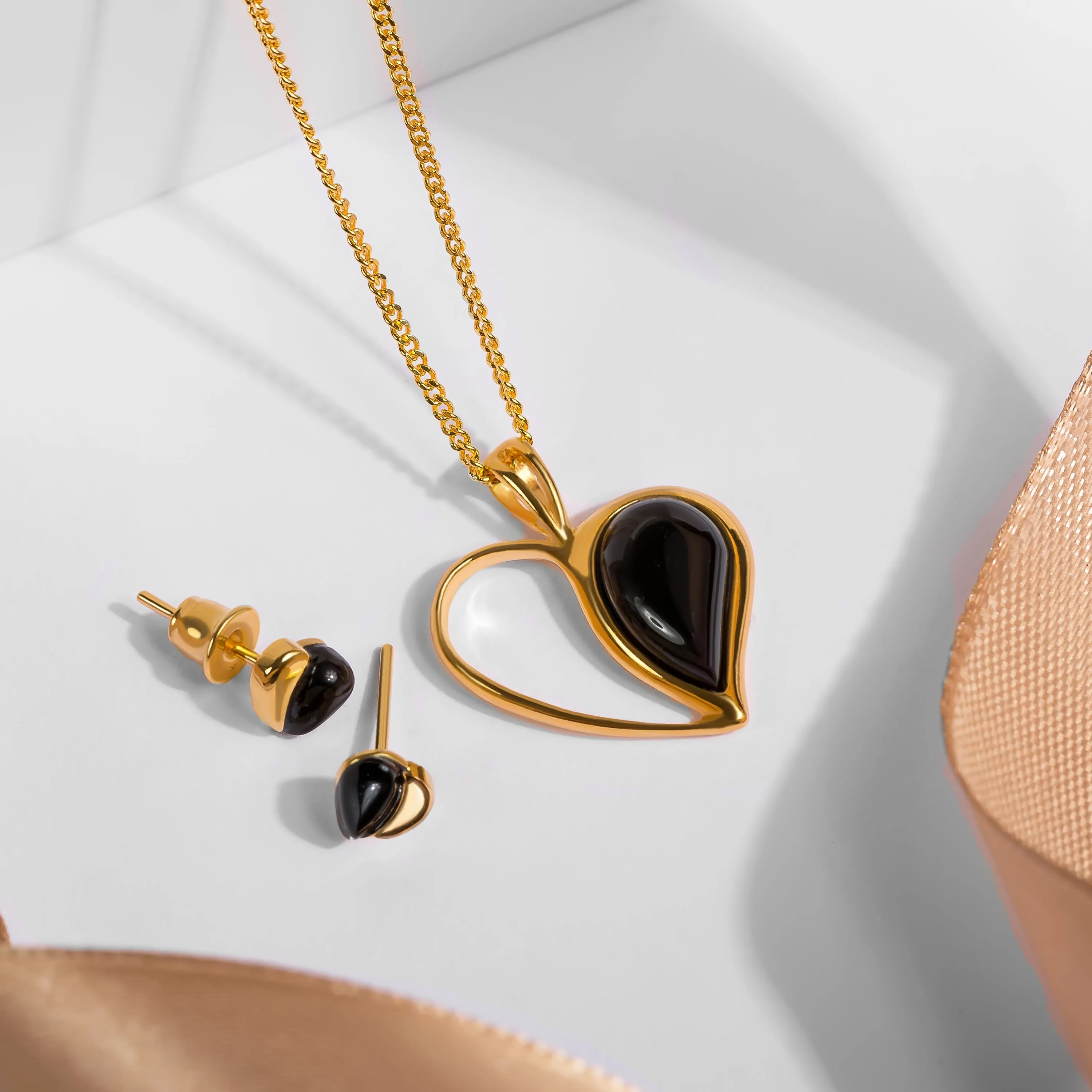 Miniature Heart Earrings in Silver with 24ct Gold and Black Onyx sold by Henryka product image thumbnail 5