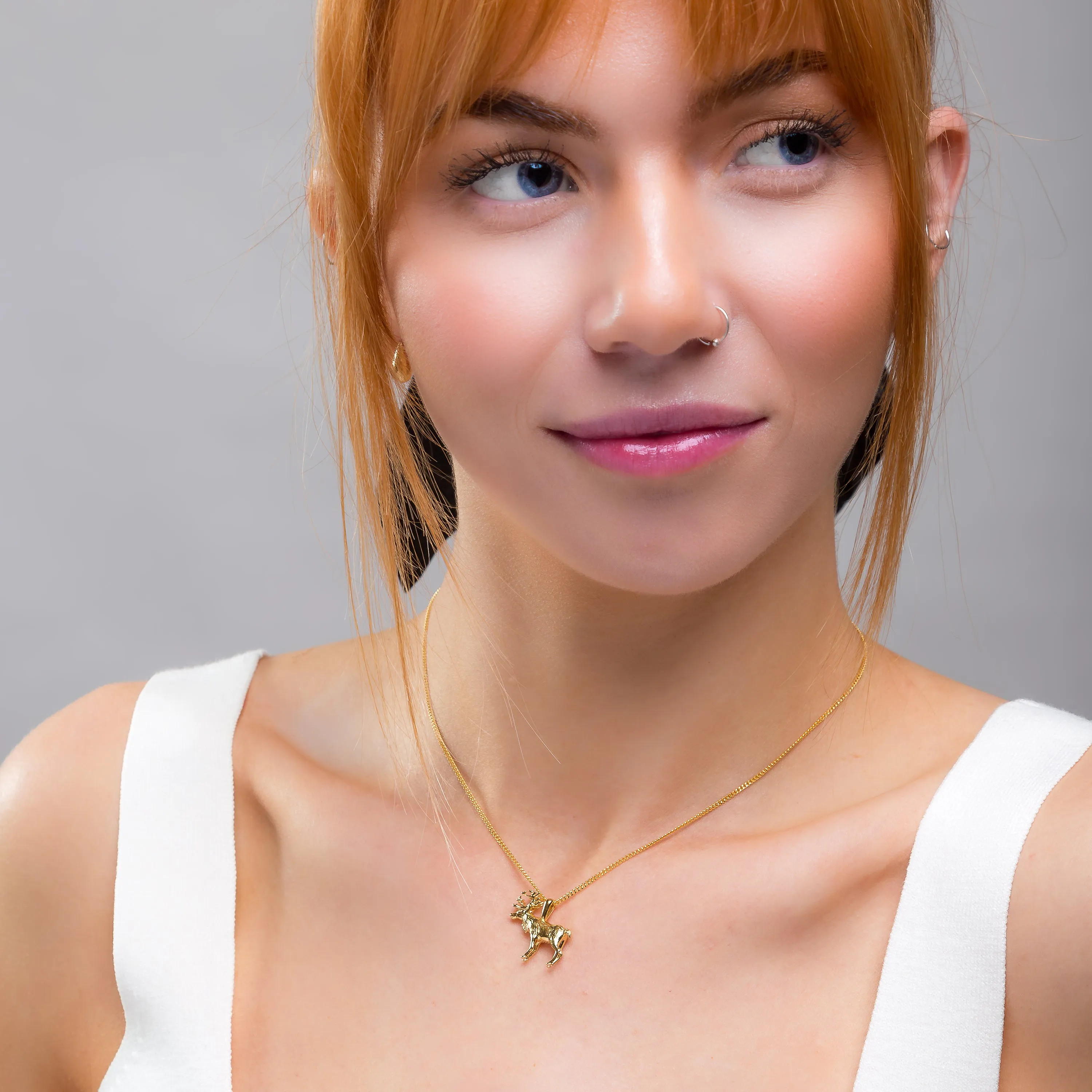 Reindeer / Stag Necklace in Solid Silver with 24ct Gold sold by Henryka product image thumbnail 3