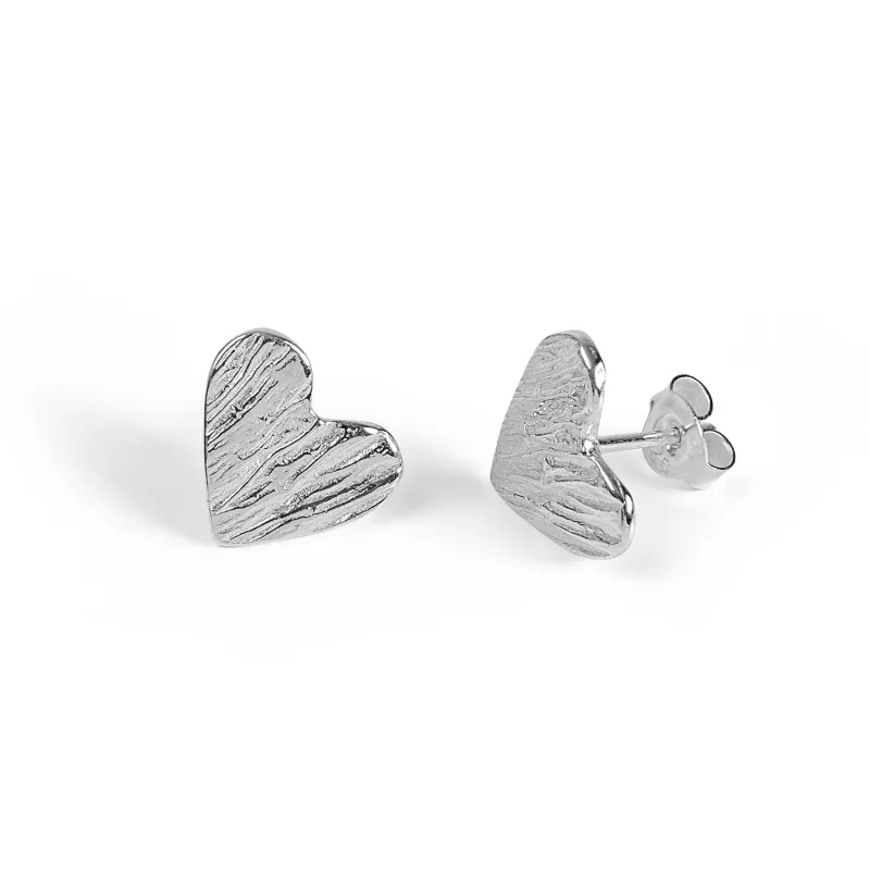 Textured Heart Stud Earrings in Silver sold by Henryka