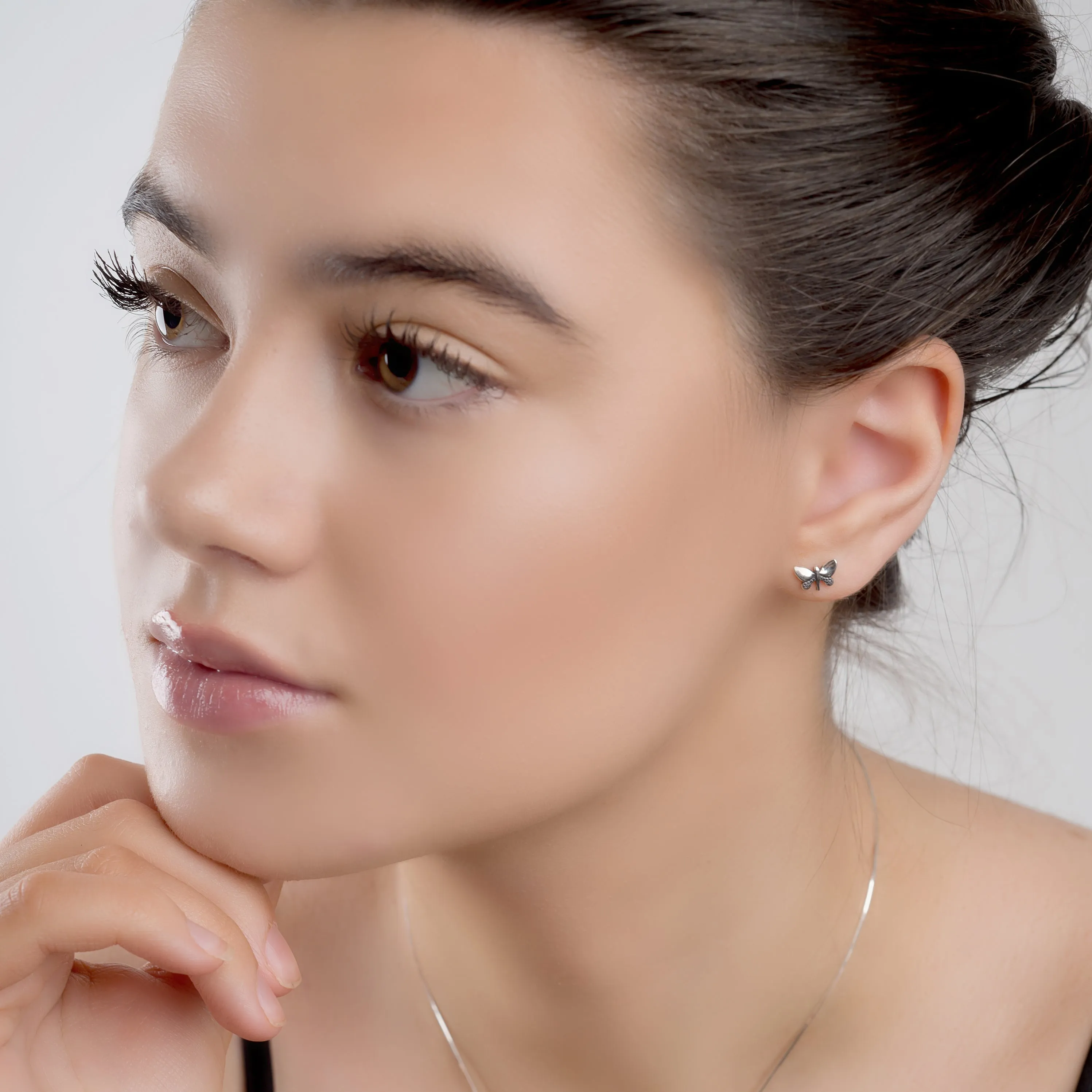 Cute Butterfly Stud Earrings in Silver sold by Henryka product image thumbnail 3