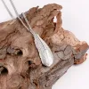 Bird Feather Necklace in Silver sold by Henryka