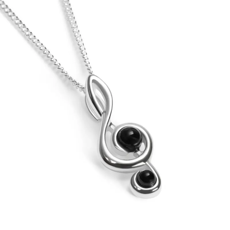 Musical Treble Clef Necklace in Silver and Black Onyx sold by Henryka