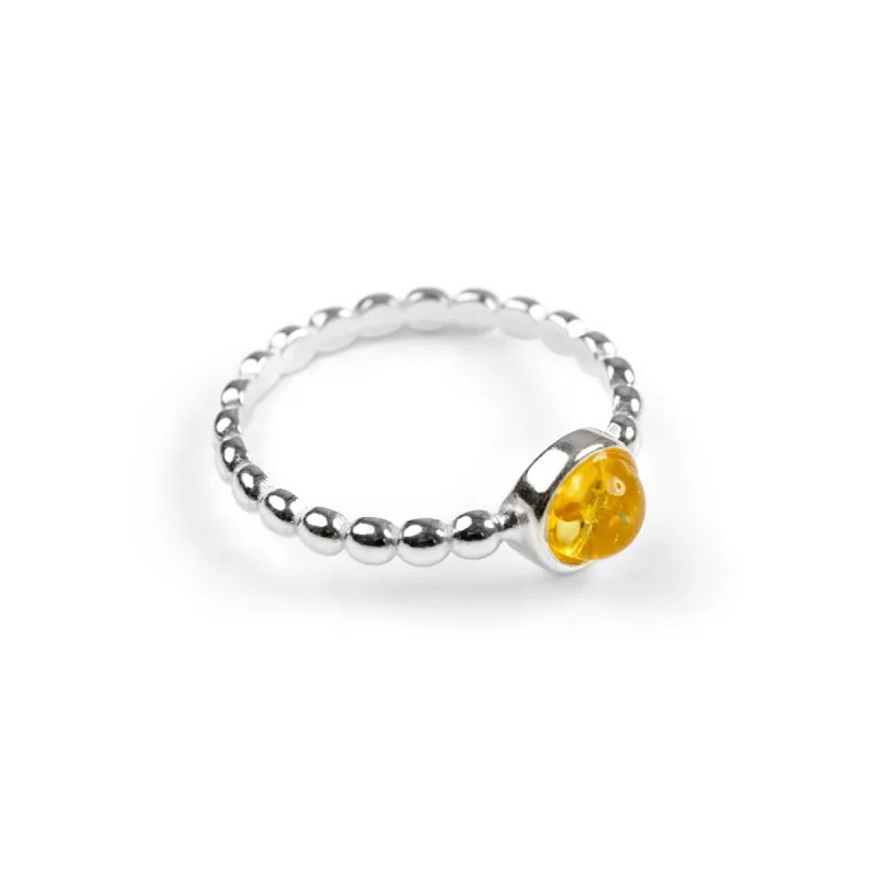 Round Charm Bead Ring in Silver and Yellow Amber sold by Henryka