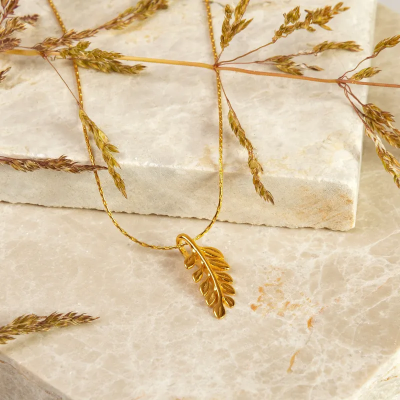 Miniature Royal Fern Leaf Necklace in Silver with 24ct Gold sold by Henryka