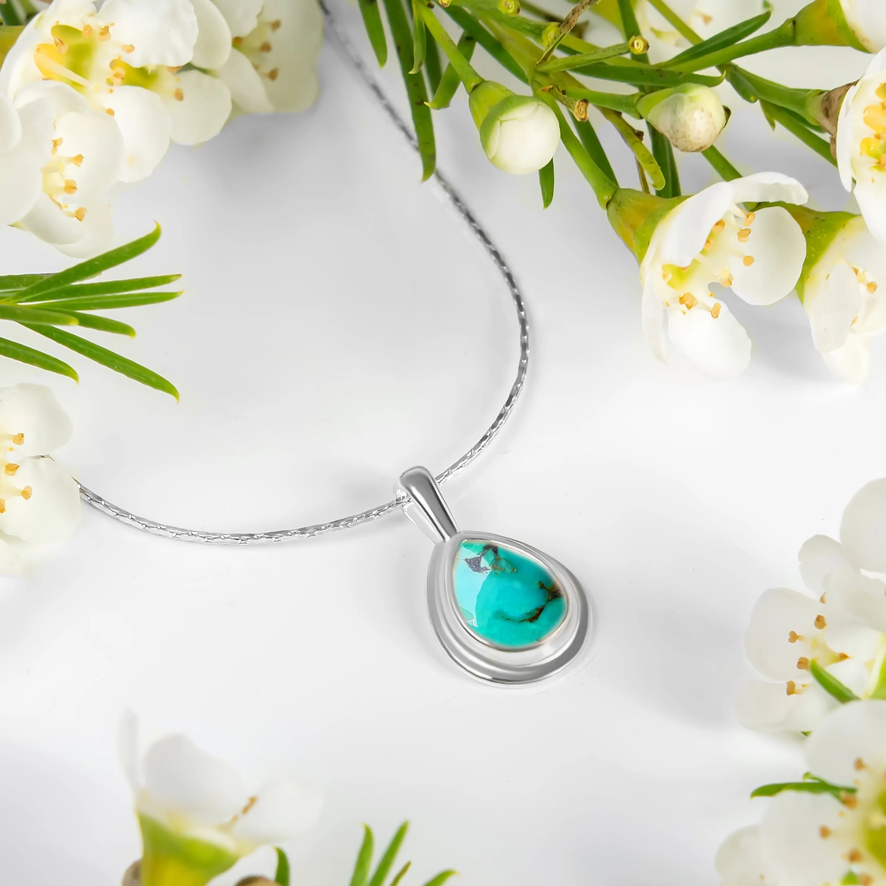 Teardrop Necklace in Silver and Natural Turquoise sold by Henryka