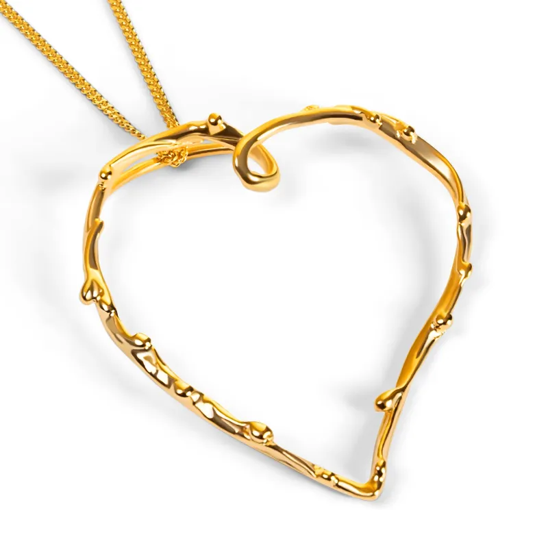 Oversized Open Heart Necklace in Sterling Silver with 24ct Gold sold by Henryka