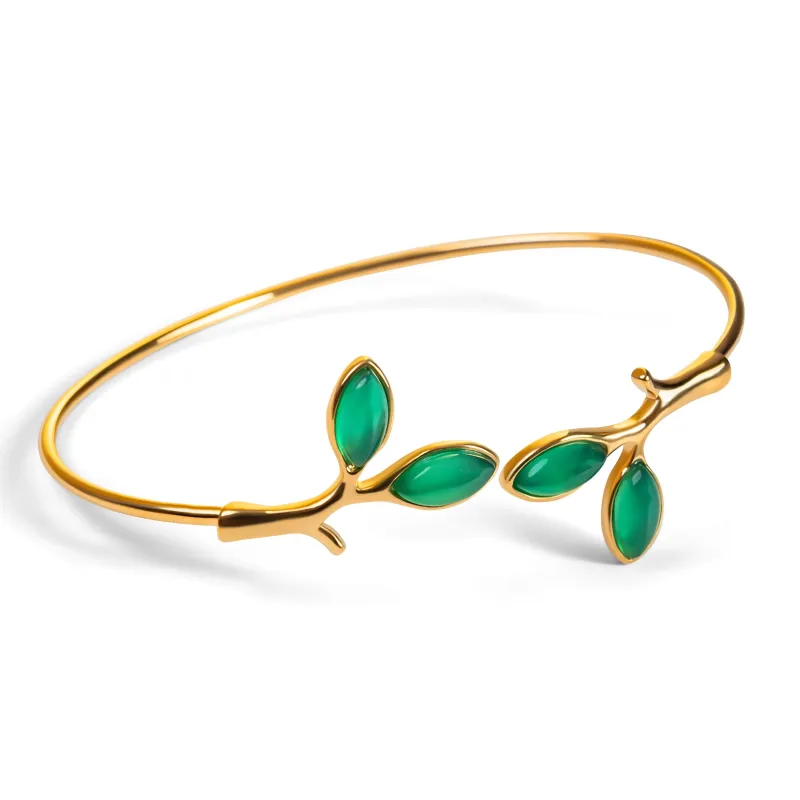 Simple Olive Leaf Branch Bangle in Silver with 24ct Gold and Green Onyx sold by Henryka