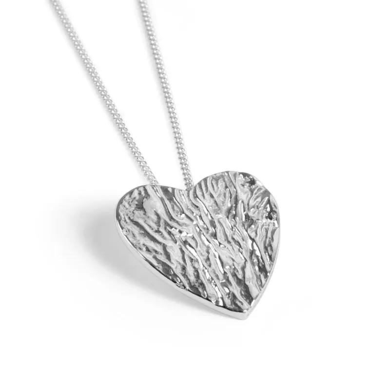Simple Textured Heart Necklace in Sterling Silver sold by Henryka