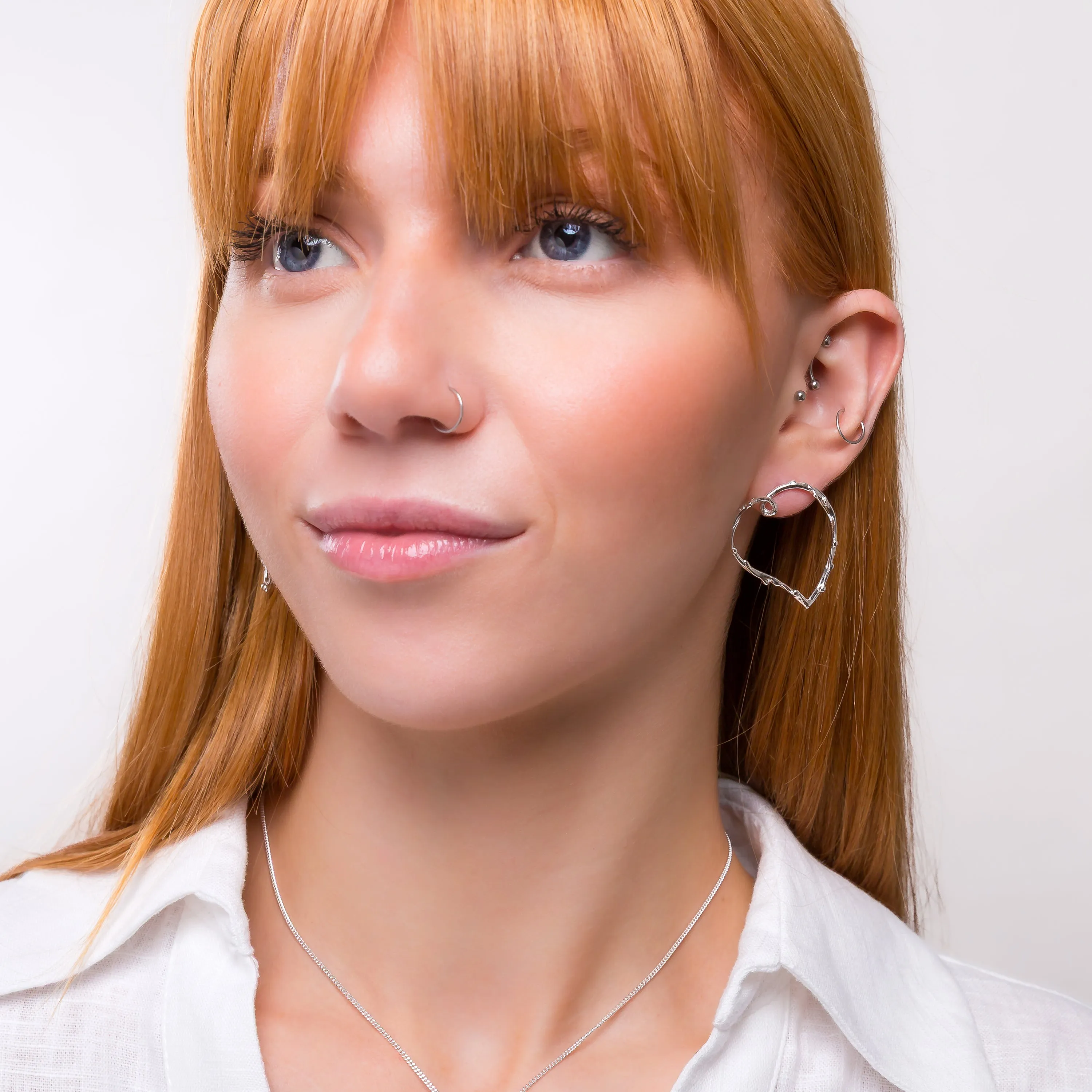 Oversized Open Heart Earrings in Sterling Silver sold by Henryka product image thumbnail 3
