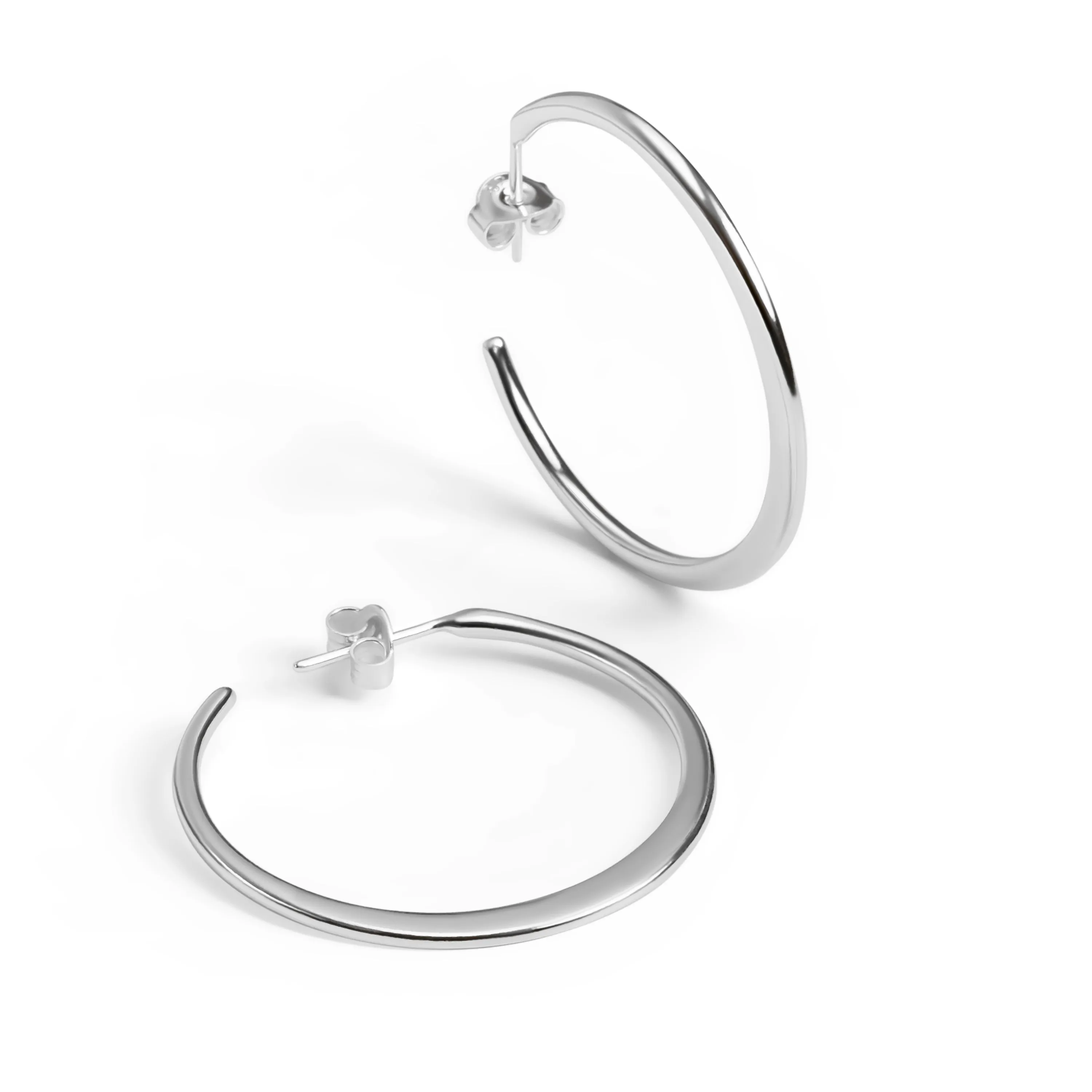 Simple Solid Hoop Earrings in Sterling Silver sold by Henryka