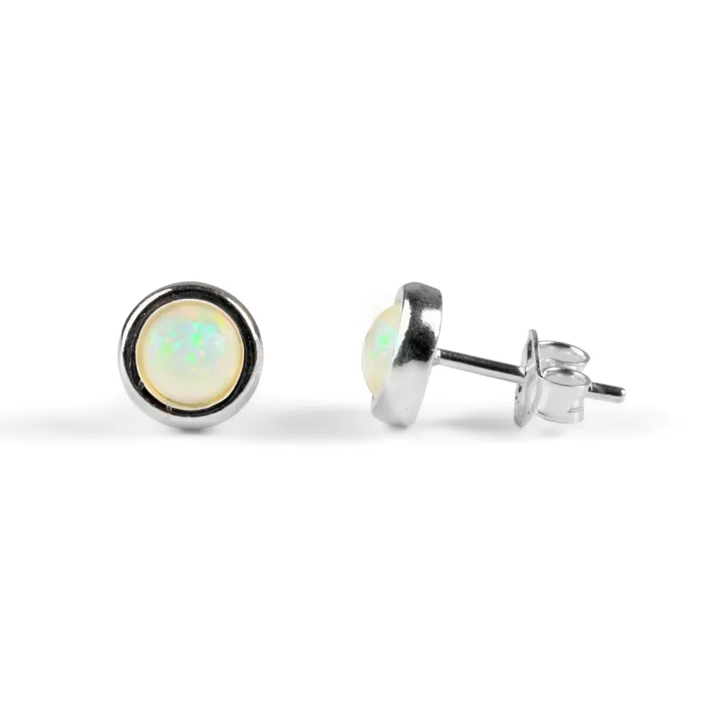 Small Round Stud Earrings in Silver and Ethiopian Opal sold by Henryka