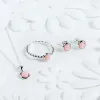 Small Round Stud Earrings in Silver and Pink Opal sold by Henryka