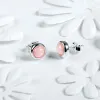 Small Round Stud Earrings in Silver and Pink Opal sold by Henryka