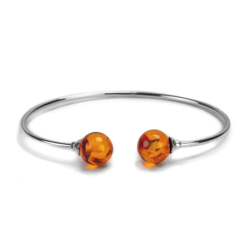 Double Ball Cuff Bangle in Silver & Amber sold by Henryka