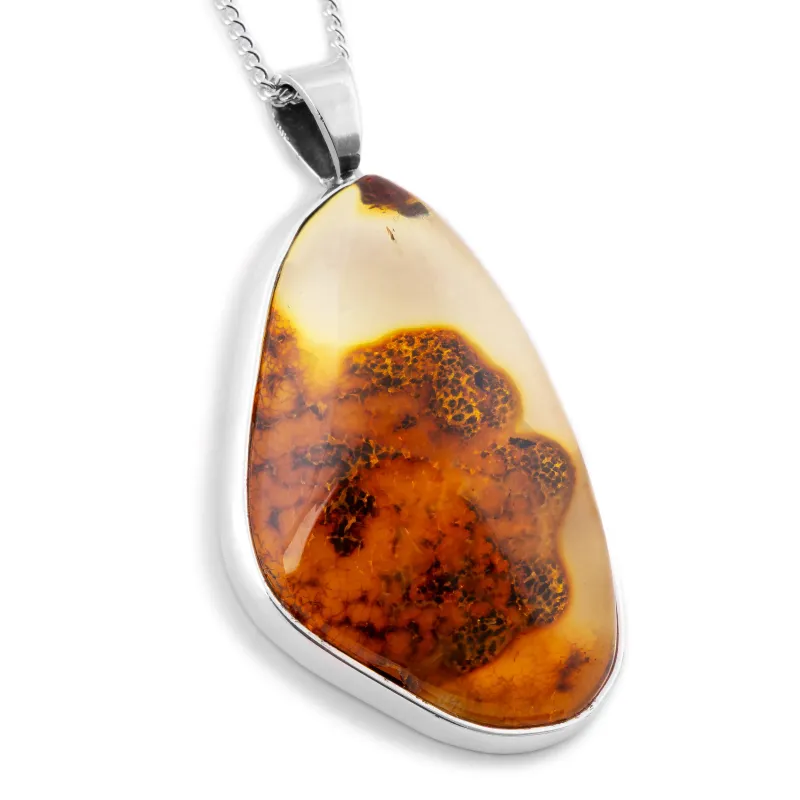 Earth’s Edge: Raw Baltic Amber in Natural Form with Raw Bark Back sold by Henryka