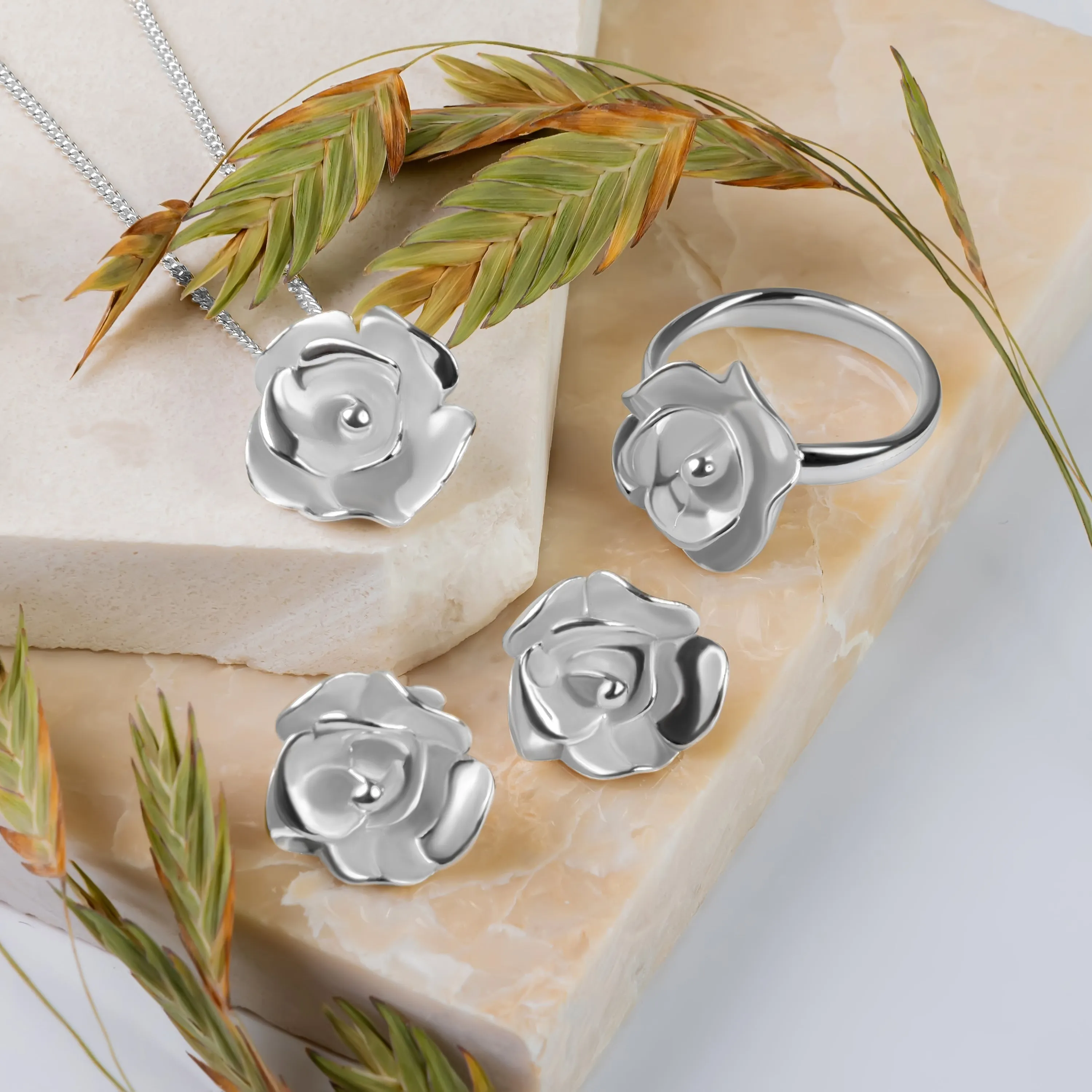 Open Rose Stud Earrings in Sterling Silver sold by Henryka product image thumbnail 3