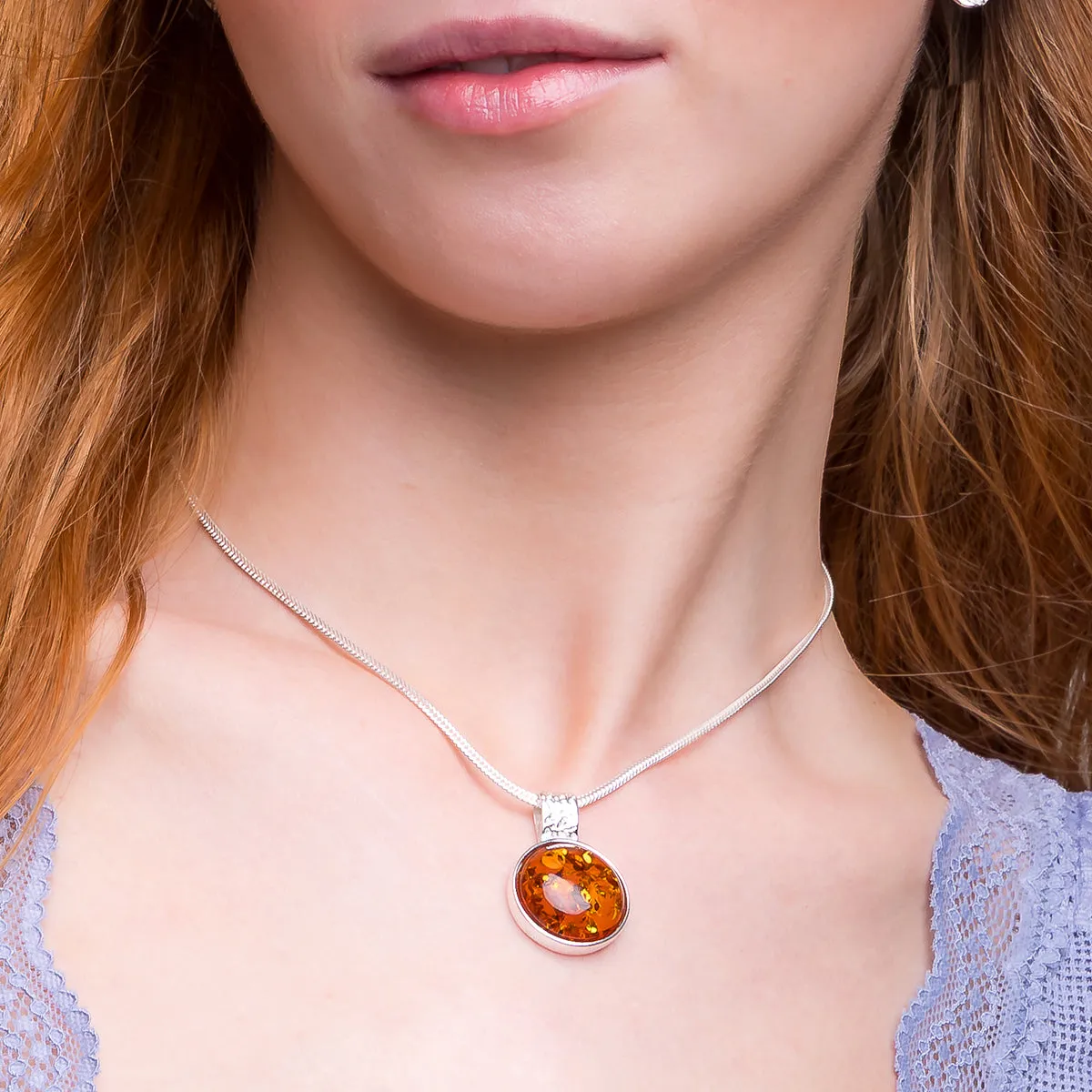Perfect Circle Baltic Amber Necklace in Sterling Silver sold by Henryka product image thumbnail 2