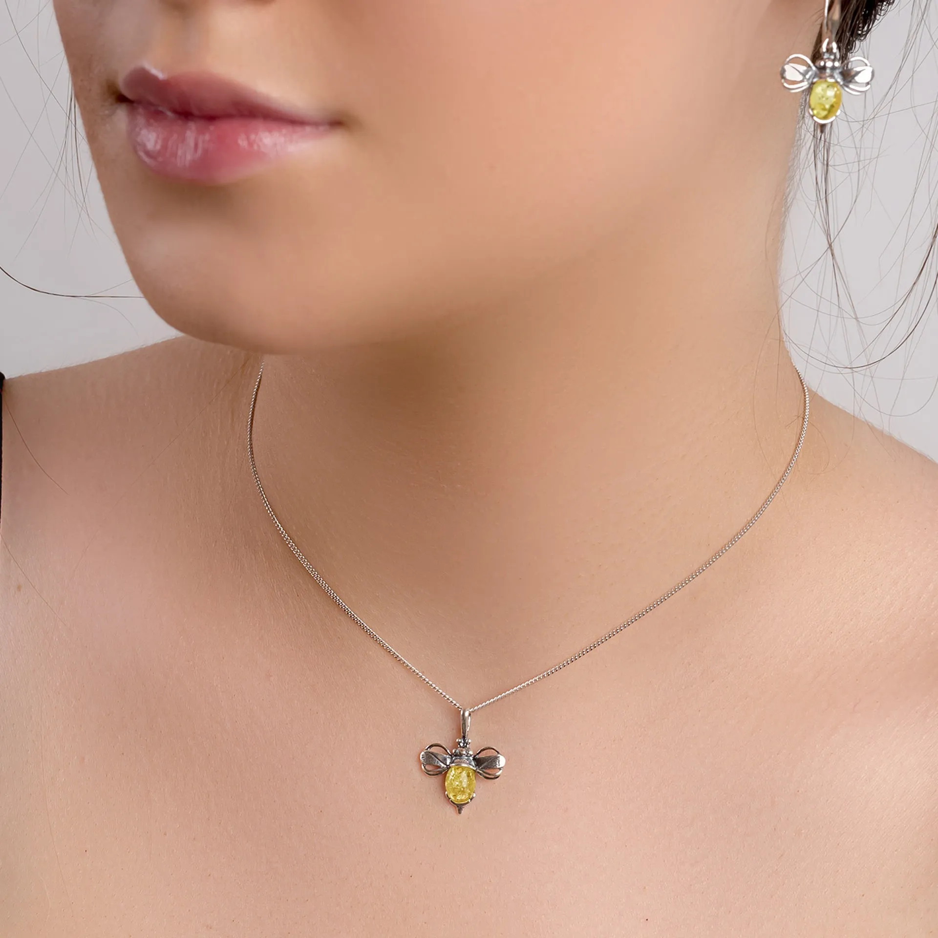 Miniature Bumble Bee Necklace in Silver and Yellow Amber sold by Henryka product image thumbnail 2