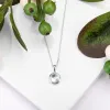 Round Charm Necklace in Silver and Blue Topaz sold by Henryka