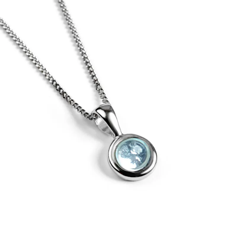 Round Charm Necklace in Silver and Blue Topaz sold by Henryka