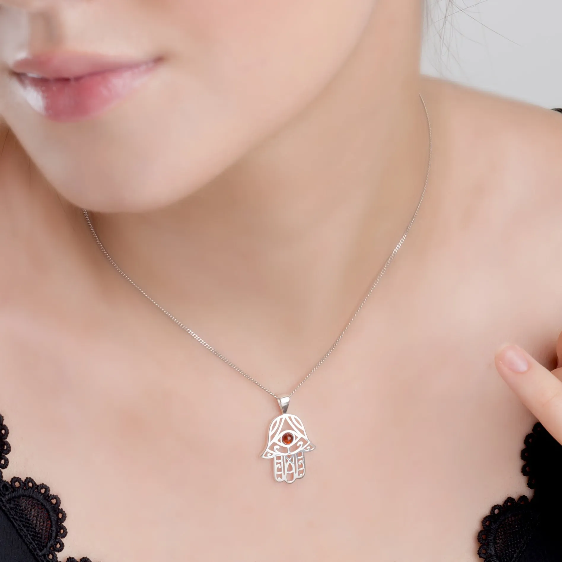 Hamsa Hand Necklace in Silver and Amber sold by Henryka product image thumbnail 2