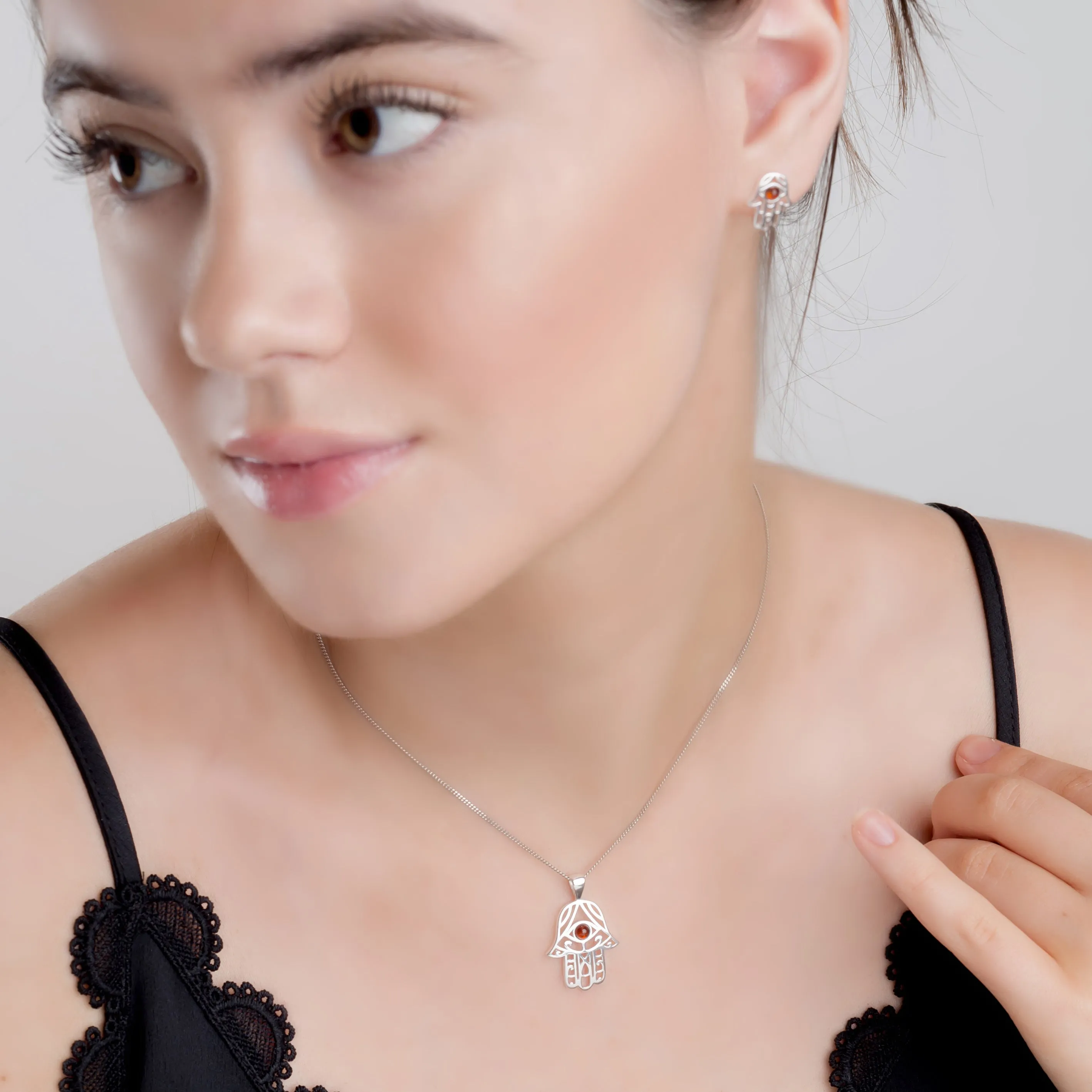 Hamsa Hand Necklace in Silver and Amber sold by Henryka product image thumbnail 3