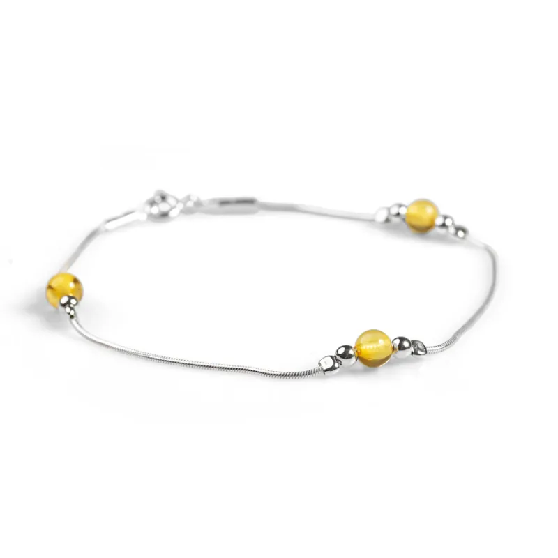 Bead Bracelet in Silver and Yellow Amber sold by Henryka