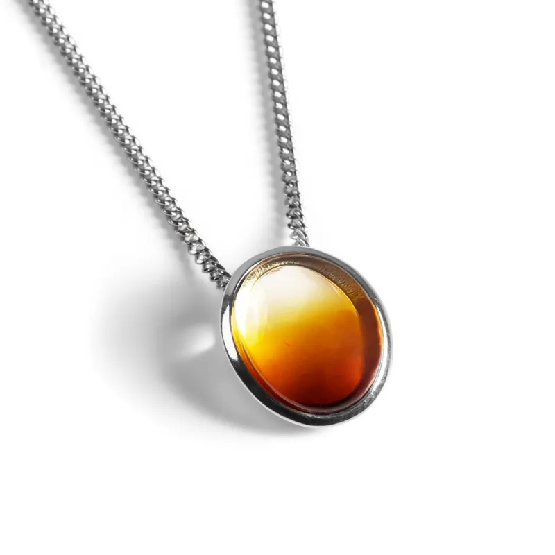 Oval Burning Amber Necklace in Silver and Amber sold by Henryka