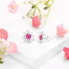 Daisy Stud Earrings in Silver and Ruby sold by Henryka